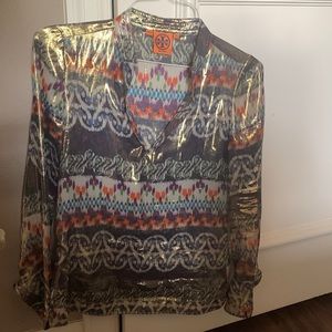 Multi-colored tunic with gold shimmer. Looks great with pants or jeans